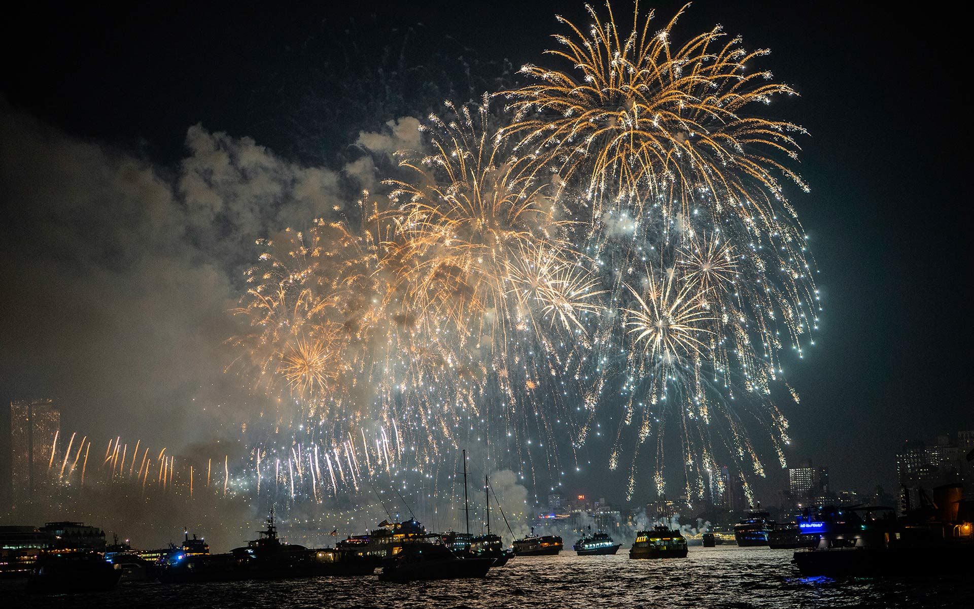 Fireworks light up the sky in NY Harbor on 4th of July