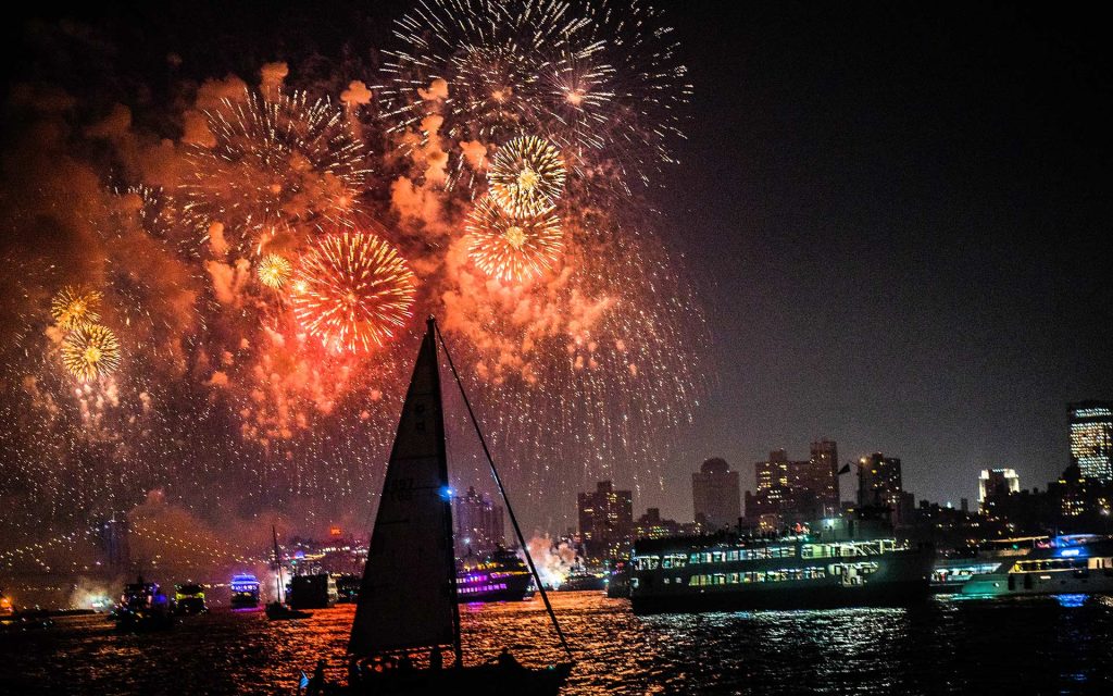 Fireworks light up the sky in NY Harbor on 4th of July
