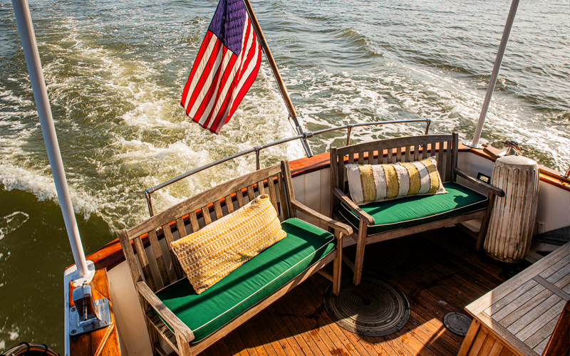 Back deck of the Yacht Full Moon showcasing seating