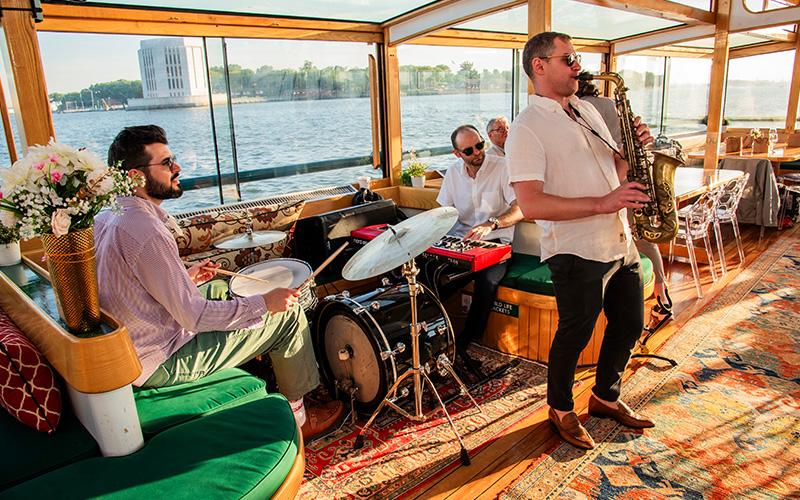 Three person Jazz Cruise in NY Harbor on a classic boat.