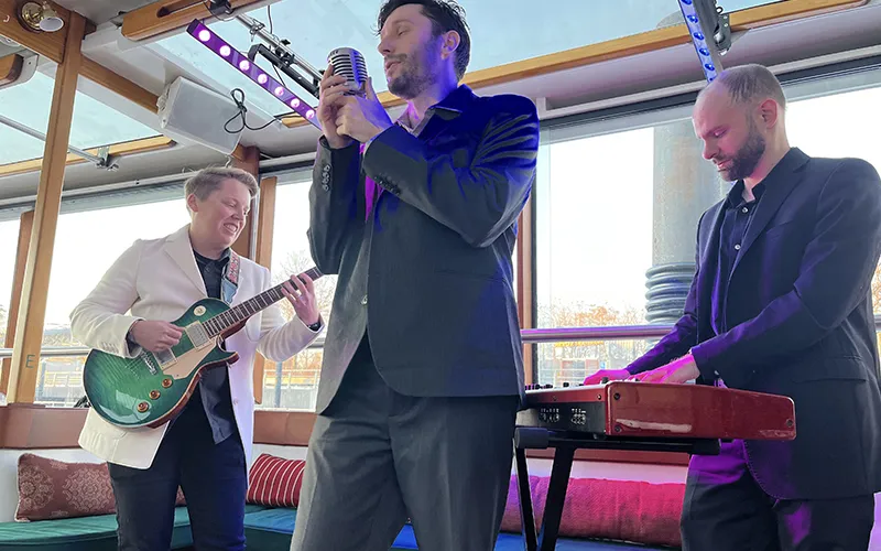 Band singing on a boat for Valentine's Day