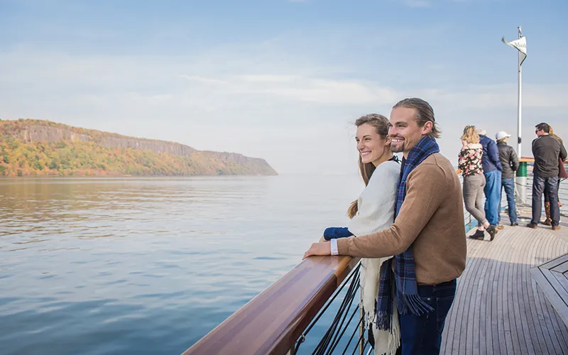 FallFoliage5 Couple on a Fall Foliage Cruise looking at the Grand Palisades with Classic Harbor Line