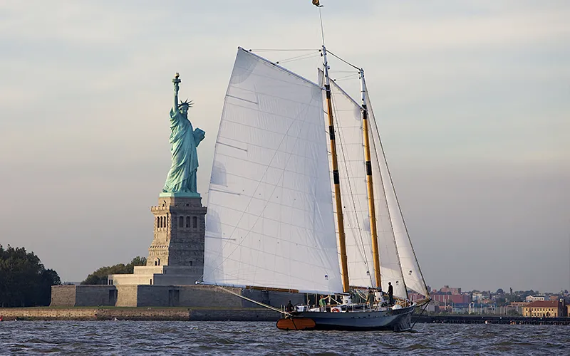 TidesTapas7 Schooner America 2.0 Sailing infront of the Statue of Liberty in NY Harbor