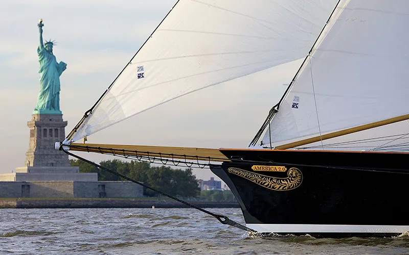 TidesTapas8 Schooner America 2.0 sailing infront of the Statue of Liberty in NY Harbor