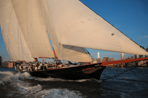 Schooner America 2.0 sailing on a sunny day in the Hudson River 