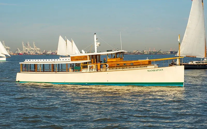 Sail250Manhattan Yacht Manhattan in NY Harbor with sailboats all around it