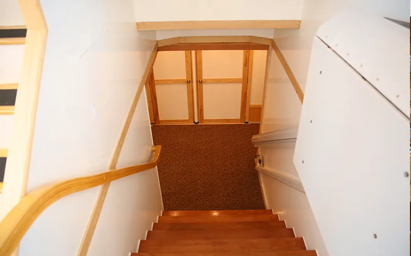 Staircase leading to the bathrooms aboard the yacht Manhattan III