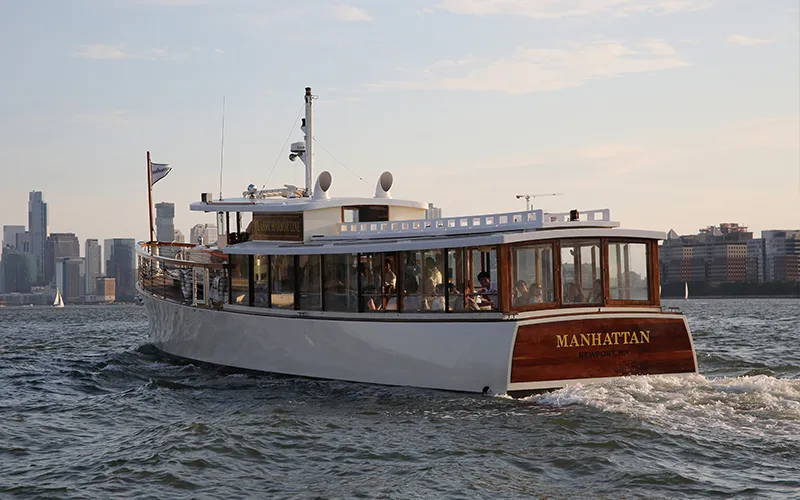 Yacht Manhattan Cruising in the Hudson River at Sunset