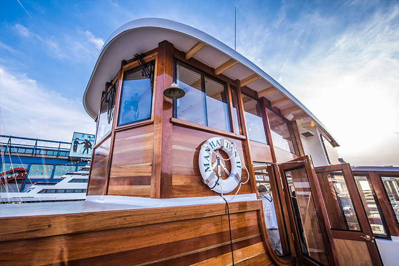 Yacht Manhattan II Captain Wheel House from the outside looking in