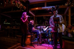 Live band playing holiday music for an evening cruise aboard the yacht Manhattan II 